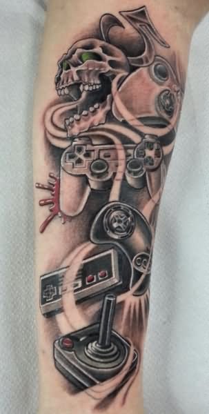 Grey Ink Video Game Remotes Tattoo On Arm