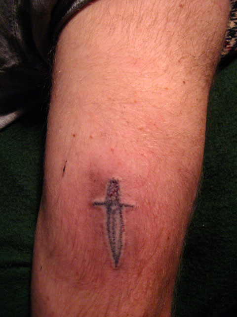 Homemade Knife Tattoo On Leg