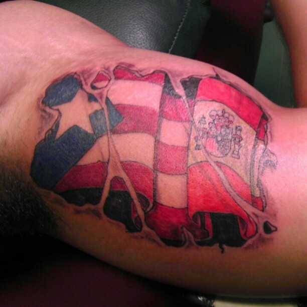 International Flag Tattoo On Muscles