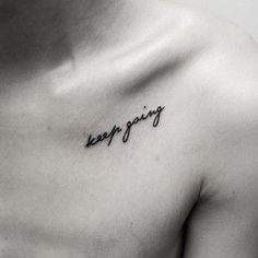 Keep Going Words Tattoo On Collarbone