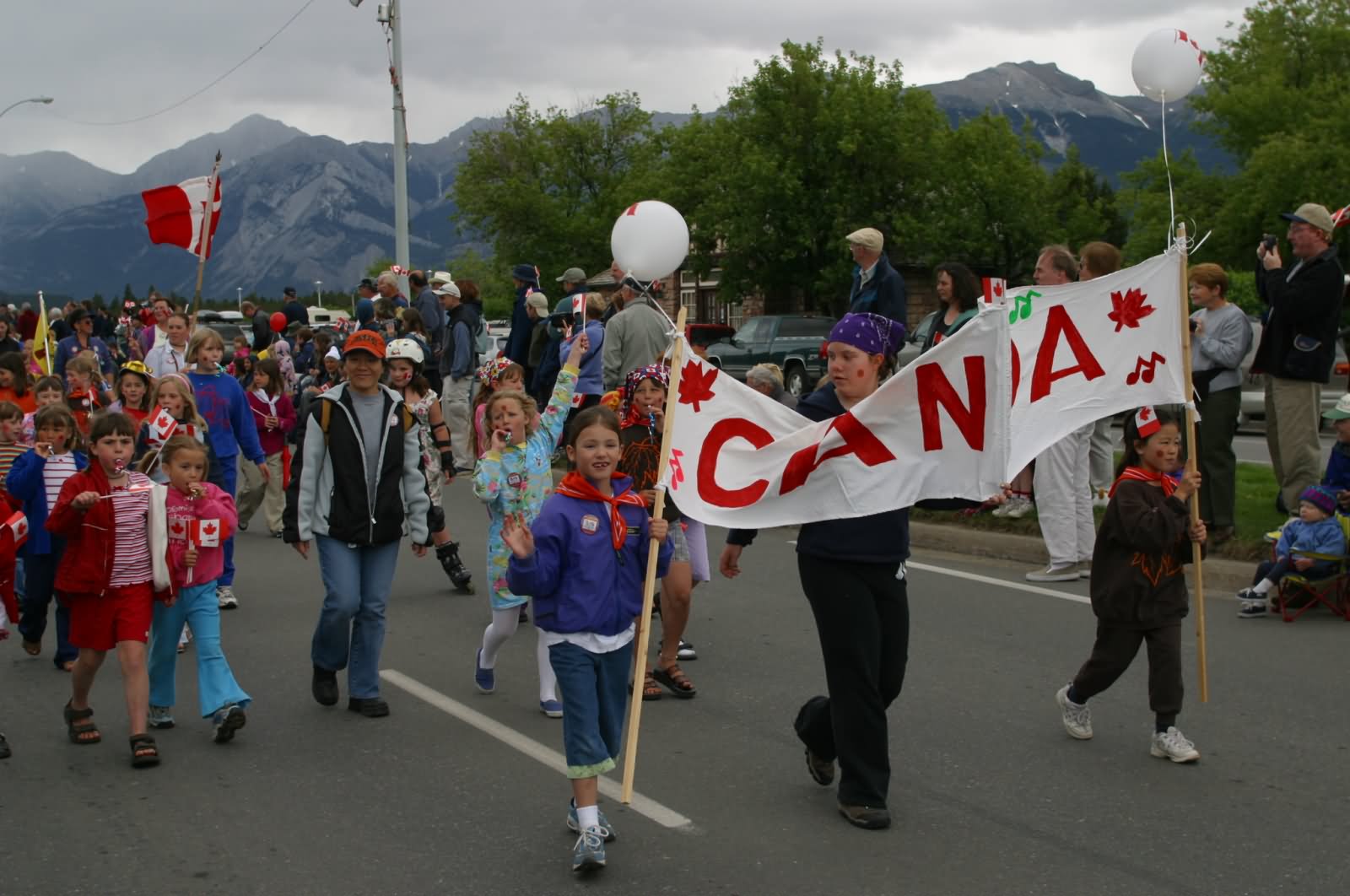 Kids Taking Part In Canada Day Parade Image