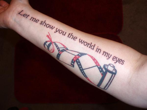 Let Me Show You The World In My Eyes - Cinema Tattoo On Right Forearm