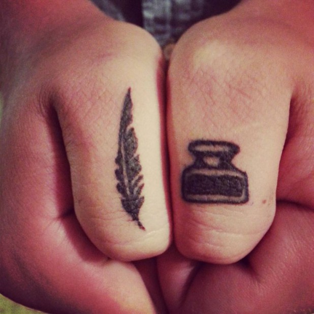 Literary Ink Bottle And Feather Tattoo On Both Thumb