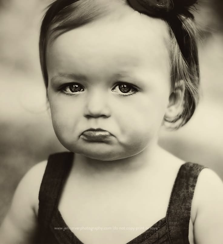 Little Girl Funny Sad Face Photo