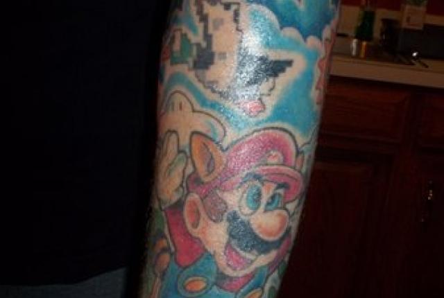 Mario Video Game On Left Arm