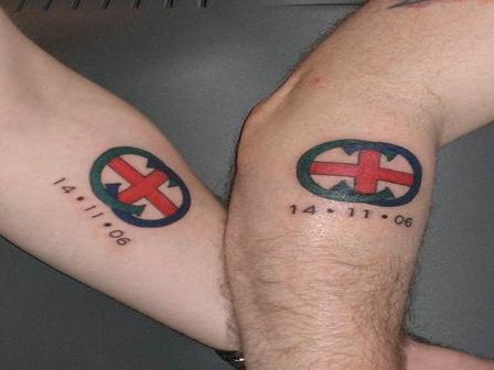 Memorial International Flag Tattoos On Couple Arms