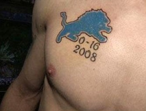 Memorial Lions Sports Tattoo On Man Chest
