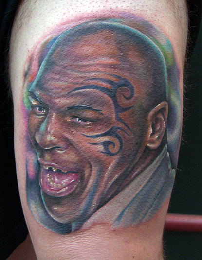 Mike Tyson Sports Tattoo On Bicep