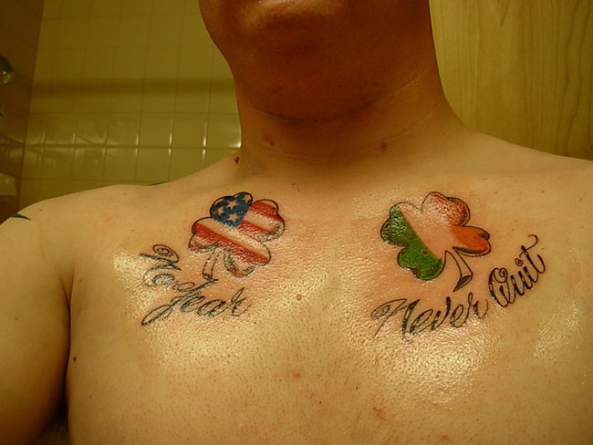 No Fear Never Quit Us Flag In Four Leaf Irish Tattoo On Collarbones