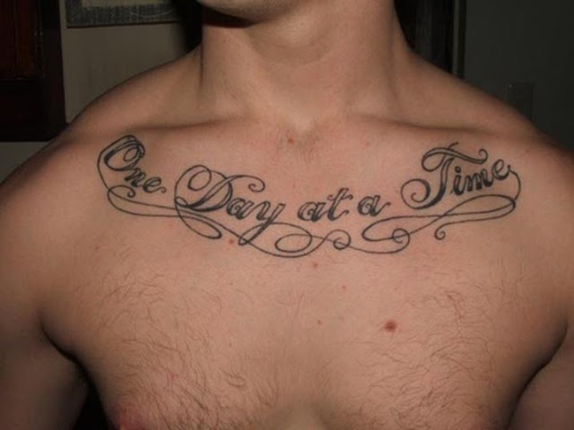 One Day At A Time Words Tattoo On Man Collarbone