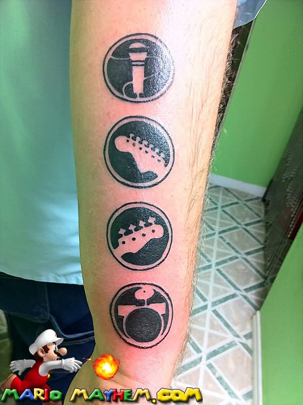 Paul Rockband Video Game Tattoo On Right Arm