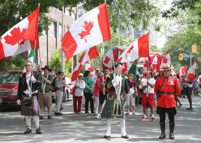 People Take Part In Canada Day Parade Picture