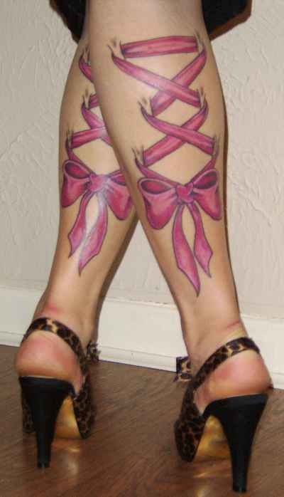Pink Corset Bow Tattoo On Both Leg Calf