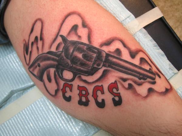 Pistol And Country Boy Tattoo On Leg