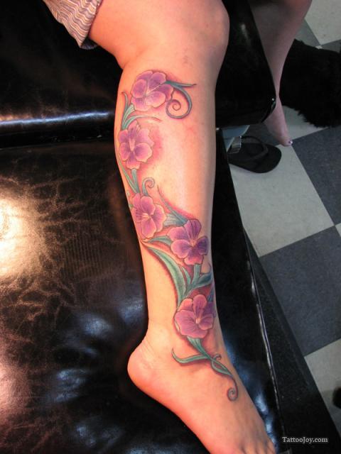 Purple Flowers Tattoo On Right Leg