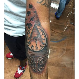Pyramid Clock Tattoo On Left Forearm