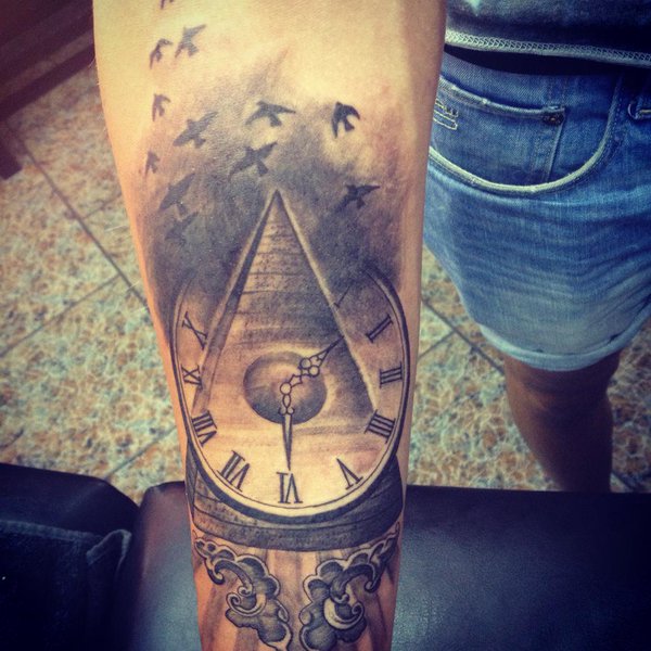 Pyramid Clock With Flying Birds Tattoo Design For Forearm