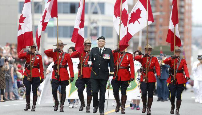 RCMP Members Taking Part In Canada Day Parade