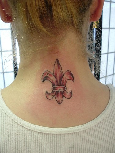 Red Ink Fleur De Lis Tattoo On Upper Back