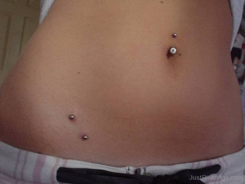 Right Surface Hip And Belly Piercing