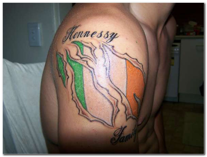 Ripped Skin Irish Flag Tattoo On Right Shoulder