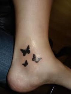 Silhouette Three Funky Butterflies Tattoo On Ankle