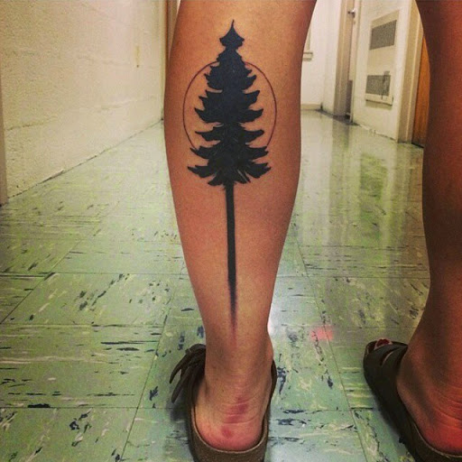 Silhouette Tree Tattoo On Left Leg Calf
