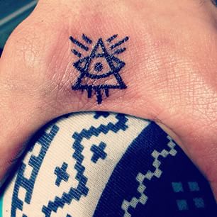 Simple Black Outline Eye With Pyramid Tattoo On Hand