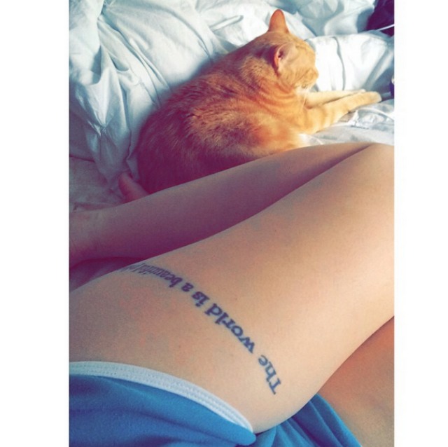 Simple Literary Tattoo On Side Thigh