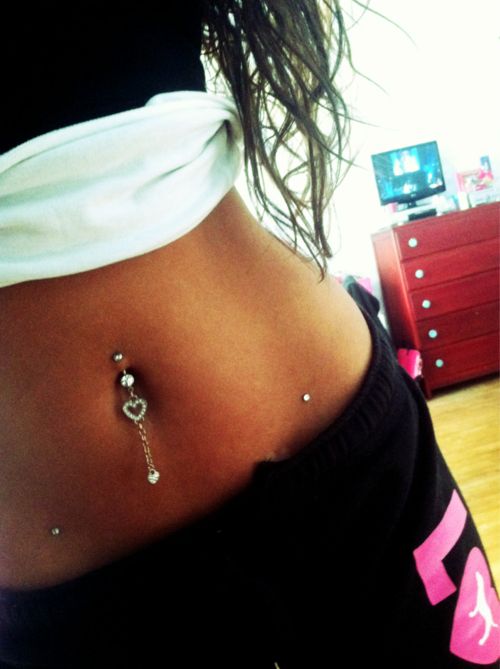 Single Dermal Hips And Belly Piercing For Girls