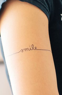 Smile Word Band Tattoo On Right Half Sleeve