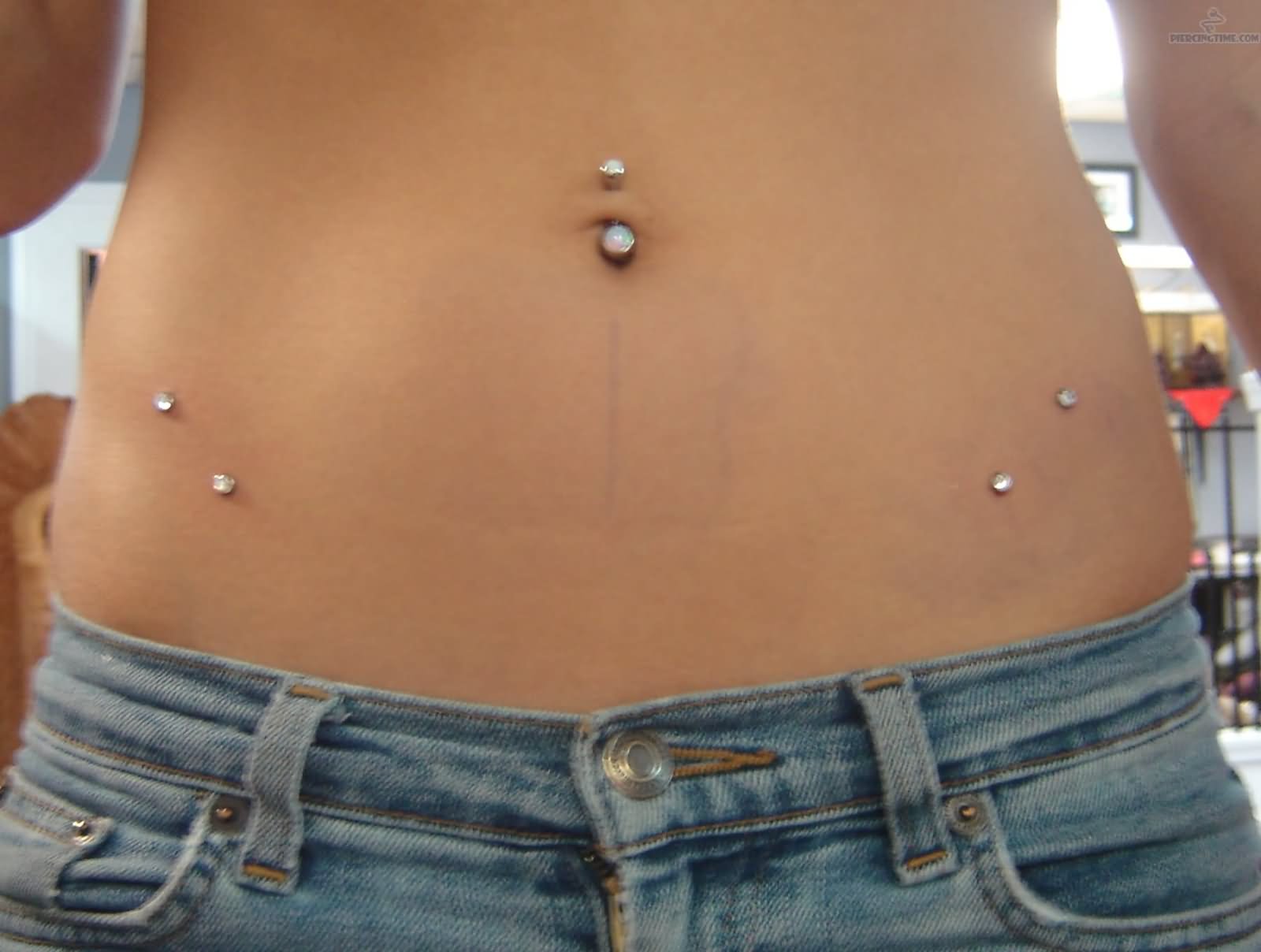 Surface Hip Piercing And Belly Piercing Image