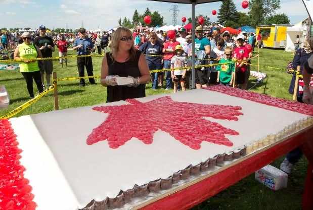 There Was A Long Line Up For Free Canada Day Cake Served During Canada Day Celebration