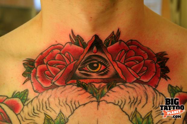 Traditional Eye In Pyramid With Roses Tattoo On Collarbone