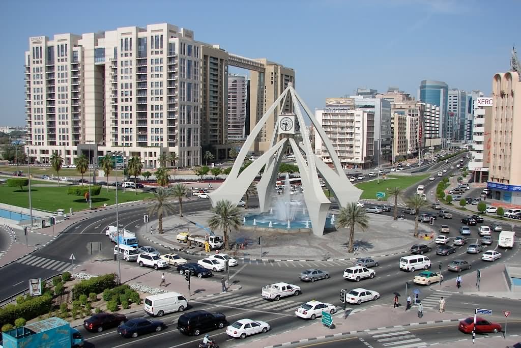 Traffic Passing From Deira Clock Tower In Dubai