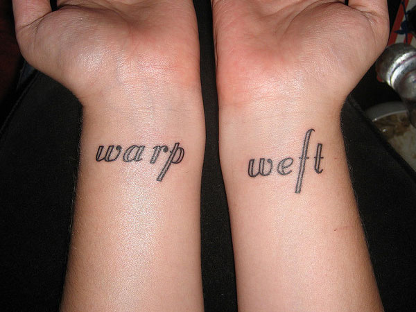 Warp Weft Words Tattoo On Both Wrist