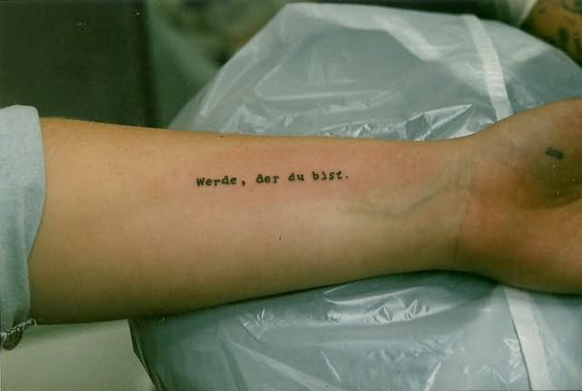 Werde Der Du Bist Words Tattoo On Forearm