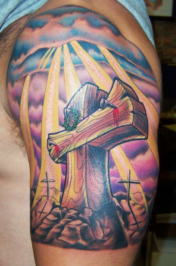 Amazing Cross Scenery Tattoo On Shoulder