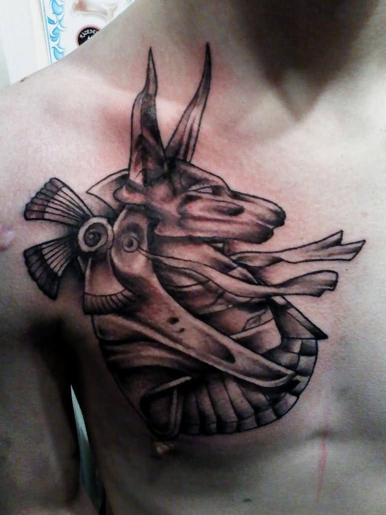 Amazing Grey Ink Anubis Head Tattoo On Front Shoulder
