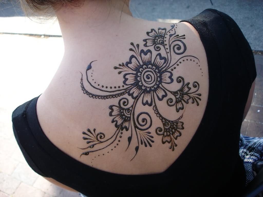 Attractive Black Henna Flowers Tattoo On Upper Back By Cheers