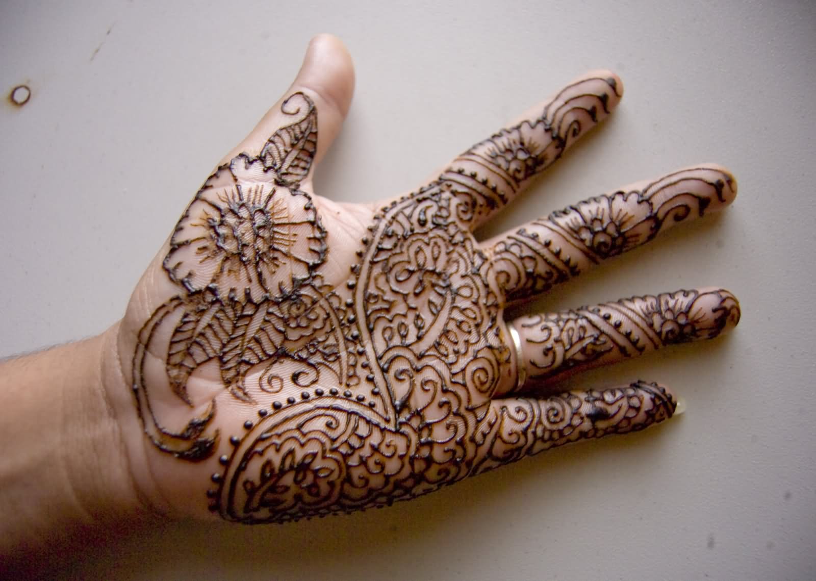 Attractive Henna Flowers Tattoo On Hand Palm By Polkadotkat