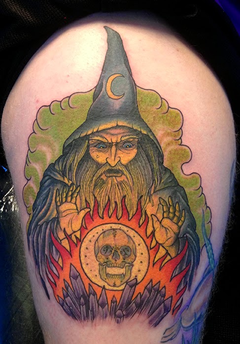 Awesome Wizard With Crystal Ball Tattoo On Thigh