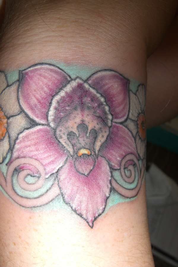 Beautiful Orchid Flower Tattoo On Wrist