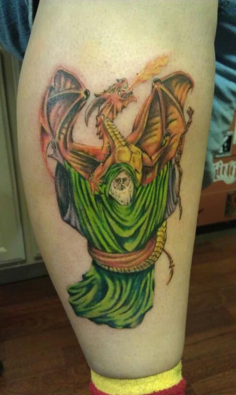 Beautiful Wizard And Dragon Tattoo On Leg