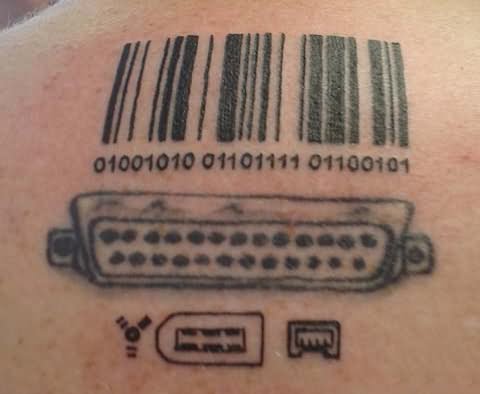 Binary Codes And VGA Cable Geek Tattoo On Upper Back