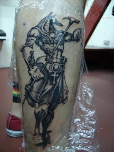 Black And Grey Anubis Tattoo On Side Leg