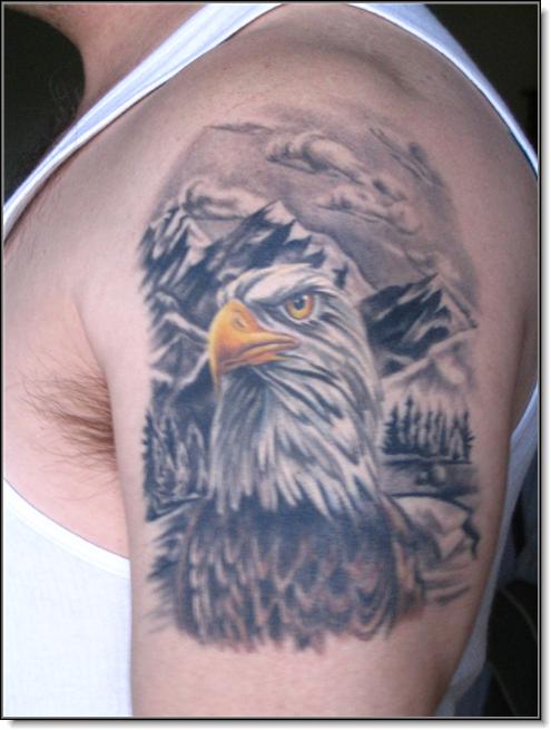 Black And Grey Eagle Scenery Tattoo On Man Left Shoulder