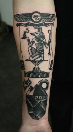 Black And Grey Ink Anubis Tattoo On Right Forearm