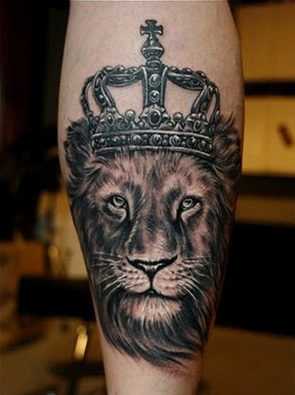Black And Grey Lion Face With King Crown Tattoo Design