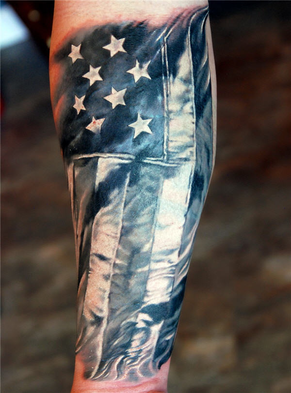 Black And Grey Military Flag Tattoo Design For Forearm
